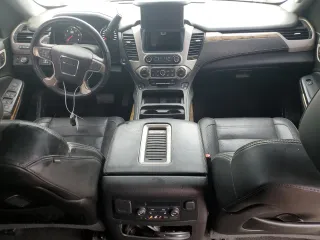 2016 GMC Yukon Denali with VIN 1GKS2CKJ0GR457895, listed as a Copart auction lot 63248354 with 118,005 mi miles and Salvage Title. Bid and sale history available at carsss.com. Image 8.