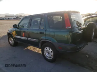 1999 Honda CR-V LX with VIN JHLRD1849XC083285, listed as a Copart auction lot 59909904 with 127,759 mi miles and Salvage Title. Bid and sale history available at carsss.com. Image 2.