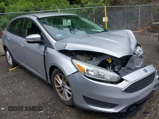 2016 Ford Focus SE z VIN 1FADP3F29GL353908, wystawiony jako IAAI lot #42289308 z przebiegiem 94 937 mil mil oraz . Historia ofert i sprzedaży dostępna na DreamBid. Obrazek 1.
