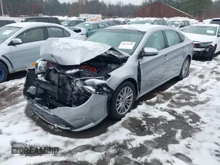 2016 Toyota Avalon XLE Premium z VIN 4T1BD1EB0GU049999, wystawiony jako IAAI lot #41624589 z przebiegiem 61 785 mil mil oraz . Historia ofert i sprzedaży dostępna na DreamBid. Obrazek 2.