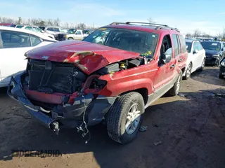 2003 Jeep Grand Cherokee Laredo with VIN 1J4GX48S13C594893, listed as a IAAI auction lot 41688597 with 179,680 mi miles. Bid and sale history available at carsss.com. Image 2.
