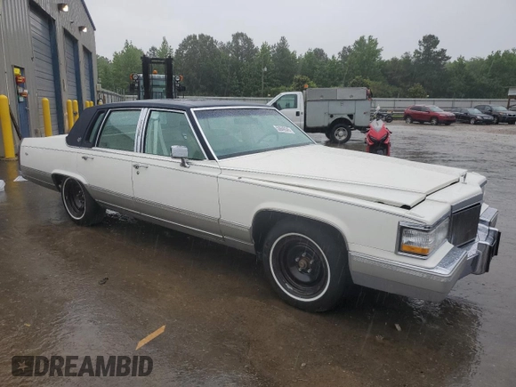 1992 Cadillac Brougham with VIN 1G6DW54E5NR708009, listed as a Copart auction lot 56849345 with 83,203 mi miles and Salvage title. Bid and sale history available at DreamBid. Image 4.