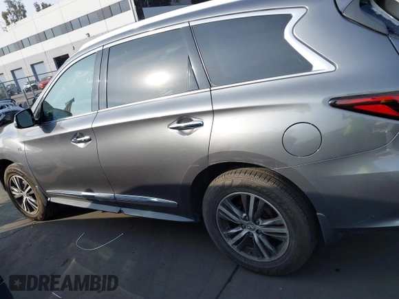 2016 Infiniti QX60 with VIN 5N1AL0MM4GC505861, listed as a IAAI auction lot 41366198 with 168,199 mi miles and . Bid and sale history available at DreamBid. Image 14.