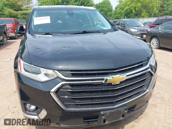 2019 Chevrolet Traverse Premier with VIN 1GNEVKKW1KJ282531, listed as a IAAI auction lot 42408361 with 95,464 mi miles and . Bid and sale history available at DreamBid. Image 12.