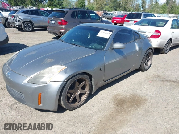 2003 Nissan 350Z Touring z VIN JN1AZ34E03T004458, wystawiony jako IAAI lot #42361684 z przebiegiem 147 847 mil mil oraz . Historia ofert i sprzedaży dostępna na DreamBid. Obrazek 2.