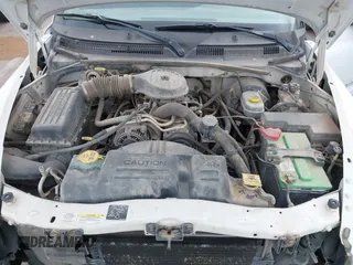 2002 Dodge Dakota with VIN 1B7GL12X32S701273, listed as a IAAI auction lot 41552573 with 157,212 mi miles and . Bid and sale history available at carsss.com. Image 9.