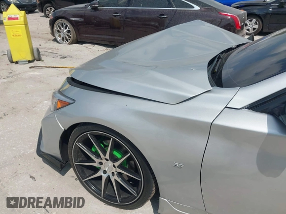 2014 Infiniti Q50 Sport с VIN JN1BV7ARXEM694019, выставлен на аукционе IAAI как лот 42182390 с пробегом 65 904 миль миль и . История ставок и продаж доступна на DreamBid. Изображение 20.