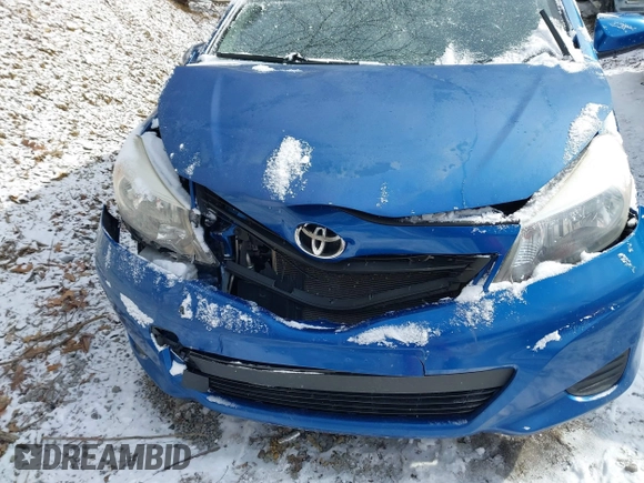 2014 Toyota Yaris L with VIN JTDKTUD34ED581773, listed as a IAAI auction lot 41620586 with 239,100 mi miles. Bid and sale history available at carsss.com. Image 6.