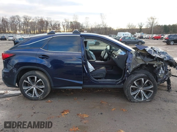 2017 Lexus RX with VIN 2T2BZMCAXHC063422, listed as a IAAI auction lot 41130585 with 63,883 mi miles. Bid and sale history available at carsss.com. Image 13.