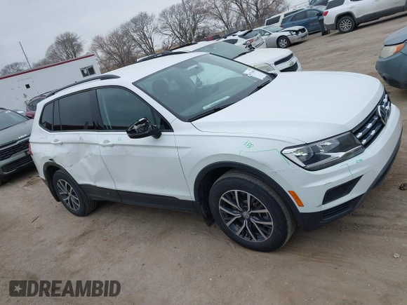 2021 Volkswagen Tiguan S z VIN 3VV0B7AX5MM071469, wystawiony jako IAAI lot #41716496 z przebiegiem 38 213 mil mil oraz . Historia ofert i sprzedaży dostępna na DreamBid. Obrazek 13.