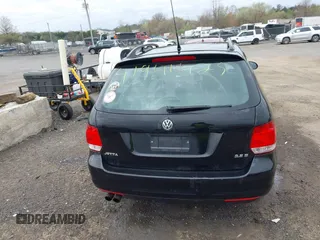 2010 Volkswagen Jetta SportWagen S with VIN 3VWKX7AJ2AM613348, listed as a IAAI auction lot 41941425 with 153,878 mi miles. Bid and sale history available at carsss.com. Image 17.