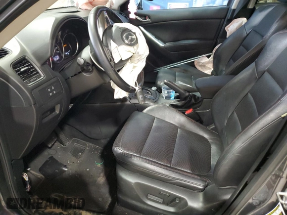 2014 Mazda CX-5 Grand Touring with VIN JM3KE4DY3E0337732, listed as a Copart auction lot 50102235 with 143,109 mi miles and Salvage Title. Bid and sale history available at carsss.com. Image 7.