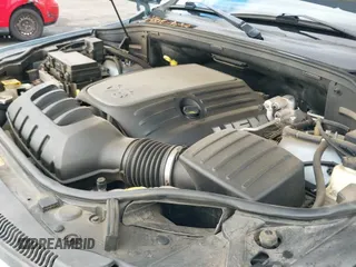 2012 Jeep Grand Cherokee Overland Summit z VIN 1C4RJFCT7CC328869, wystawiony jako IAAI lot #43166534 z przebiegiem 123 745 mil mil oraz . Historia ofert i sprzedaży dostępna na DreamBid. Obrazek 19.