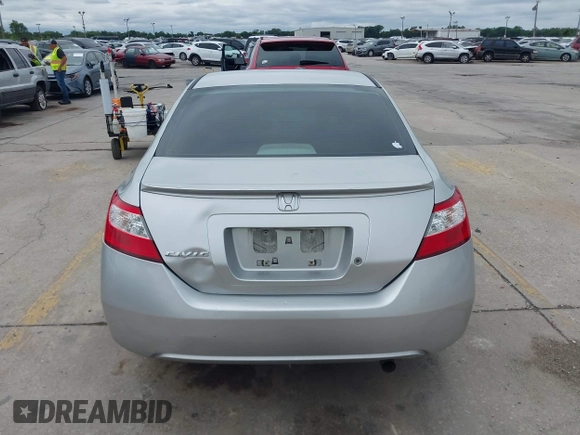 2006 Honda Civic Cpe LX with VIN 2HGFG12606H568106, listed as a IAAI auction lot 41983712 with 196,957 mi miles. Bid and sale history available at carsss.com. Image 16.