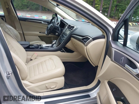 2013 Ford Fusion SE Hybrid z VIN 3FA6P0LU1DR291060, wystawiony jako IAAI lot #42731674 z przebiegiem 93 918 mil mil oraz . Historia ofert i sprzedaży dostępna na DreamBid. Obrazek 5.
