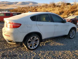 2012 BMW X6 50i with VIN 5UXFG8C54CLZ97288, listed as a Copart auction lot 81231764 with 62,657 mi miles and Salvage Title. Bid and sale history available at carsss.com. Image 3.