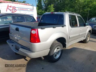 2003 Ford Explorer Sport Trac XLS z VIN 1FMZU67EX3UB19974, wystawiony jako IAAI lot #42563671 z przebiegiem 133 452 mil mil oraz . Historia ofert i sprzedaży dostępna na DreamBid. Obrazek 4.