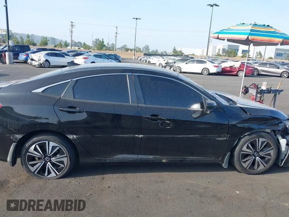 2016 Honda Civic EX-L with VIN 2HGFC1F79GH659164, listed as a IAAI auction lot 42455097 with 166,157 mi miles and . Bid and sale history available at DreamBid. Image 13.