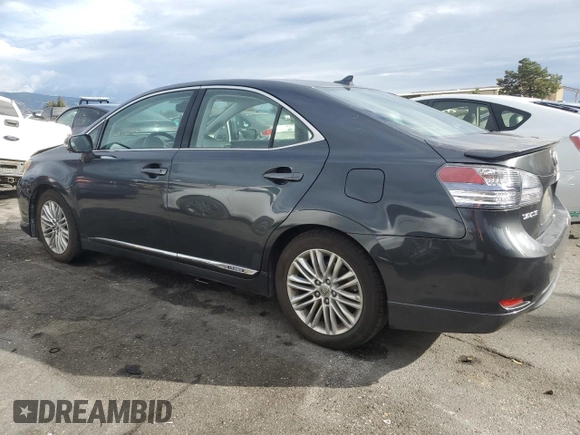 2010 Lexus HS 250h with VIN JTHBB1BA1A2024911, listed as a Copart auction lot 82253104 with 179,710 mi miles and Salvage Title. Bid and sale history available at DreamBid. Image 2.