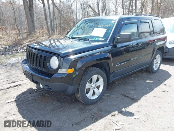 2014 Jeep Patriot Sport with VIN 1C4NJRBB1ED811019, listed as a IAAI auction lot 42181813 with 124,837 mi miles and . Bid and sale history available at DreamBid. Image 2.