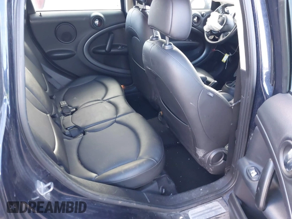 2013 MINI Countryman S with VIN WMWZC3C52DWP21475, listed as a IAAI auction lot 41215334 with 124,365 mi miles and . Bid and sale history available at DreamBid. Image 8.