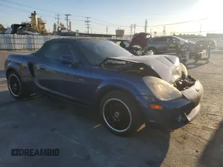 2003 Toyota MR2 z VIN JTDFR320330065914, wystawiony jako Copart lot #88791655 z przebiegiem 125 564 mil mil oraz Szkoda całkowita • Salvage title. Historia ofert i sprzedaży dostępna na DreamBid. Obrazek 4.