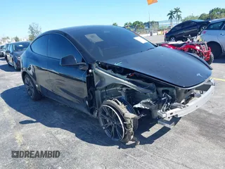 2024 Tesla Model Y with VIN 7SAYGDED2RA331436, listed as a IAAI auction lot 41713562 with 4,824 mi miles and . Bid and sale history available at DreamBid. Image 1.