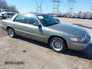 1999 Mercury Grand Marquis LS with VIN 2MEFM75W0XX712135, listed as a IAAI auction lot 41706216 with 85,292 mi miles and . Bid and sale history available at DreamBid. Image 1.