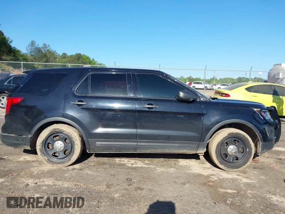 2019 Ford Police Interceptor Utility z VIN 1FM5K8AT0KGA31584, wystawiony jako IAAI lot #42011705 z przebiegiem 145 304 mil mil oraz . Historia ofert i sprzedaży dostępna na DreamBid. Obrazek 13.