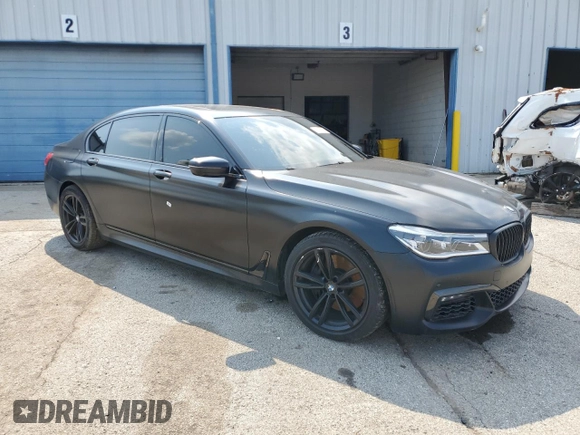 2018 BMW 7 Series ALPINA B7 xDrive with VIN WBA7F2C52JB238192, listed as a Copart auction lot 57851425 with 69,444 mi miles and Salvage title. Bid and sale history available at DreamBid. Image 4.