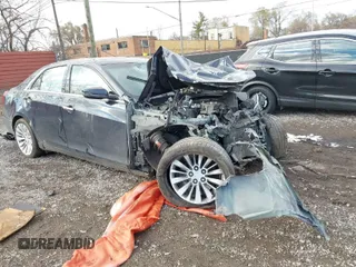 2016 Cadillac CTS Luxury Collection AWD with VIN 1G6AX5SX5G0180953, listed as a IAAI auction lot 41005332 with Not Provided miles and . Bid and sale history available at DreamBid. Image 1.