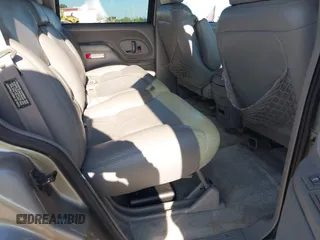 1999 Chevrolet Tahoe Z71 with VIN 1GNEK13R7XJ521373, listed as a IAAI auction lot 42131893 with 250,712 mi miles and . Bid and sale history available at DreamBid. Image 8.