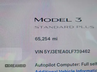 2020 Tesla Model 3 Standard Range Plus with VIN 5YJ3E1EA0LF739462, listed as a IAAI auction lot 42081889 with 65,254 mi miles. Bid and sale history available at carsss.com. Image 15.