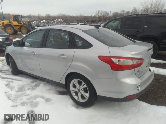 2013 Ford Focus SE with VIN 1FADP3F25DL271105, listed as a IAAI auction lot 36260870 with 122,592 mi miles. Bid and sale history available at carsss.com. Image 3.