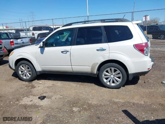 2011 Subaru Forester 2.5X Limited with VIN JF2SHBEC7BH778799, listed as a IAAI auction lot 41973395 with 216,944 mi miles. Bid and sale history available at carsss.com. Image 14.