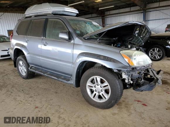 2005 Lexus GX 470 with VIN JTJBT20XX50073695, listed as a Copart auction lot 50595385 with 162,617 mi miles and Salvage Title. Bid and sale history available at carsss.com. Image 4.