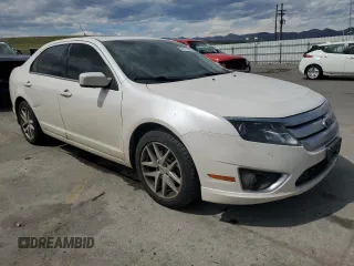 2012 Ford Fusion SEL z VIN 3FAHP0JAXCR282521, wystawiony jako Copart lot #53115505 z przebiegiem 96 833 mil mil oraz Szkoda całkowita • Salvage title. Historia ofert i sprzedaży dostępna na DreamBid. Obrazek 4.