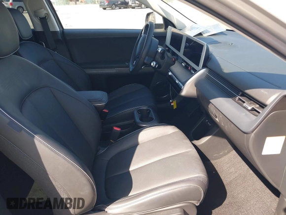 2023 Hyundai Ioniq 5 SEL with VIN KM8KNDAF6PU198425, listed as a IAAI auction lot 42316810 with 20,263 mi miles and . Bid and sale history available at DreamBid. Image 5.