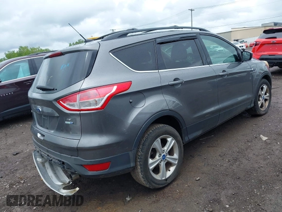 2013 Ford Escape SE with VIN 1FMCU9GX9DUA57901, listed as a IAAI auction lot 42367615 with 140,000 mi miles and . Bid and sale history available at DreamBid. Image 4.