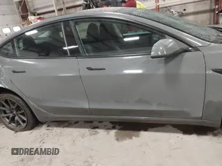 2018 Tesla Model 3 Long Range Battery with VIN 5YJ3E1EB8JF113566, listed as a IAAI auction lot 41726484 with 91,255 mi miles and . Bid and sale history available at DreamBid. Image 13.