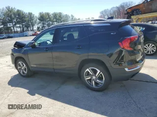 2021 GMC Terrain SLT z VIN 3GKALVEVXML374867, wystawiony jako Copart lot #50842885 z przebiegiem 32 693 mil mil oraz Szkoda całkowita • Salvage title. Historia ofert i sprzedaży dostępna na DreamBid. Obrazek 2.