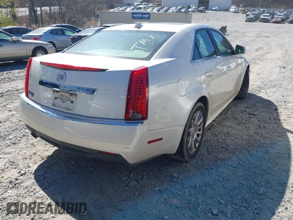 2011 Cadillac CTS Luxury z VIN 1G6DE5EY0B0159993, wystawiony jako IAAI lot #41831001 z przebiegiem 94 754 mil mil oraz . Historia ofert i sprzedaży dostępna na DreamBid. Obrazek 4.