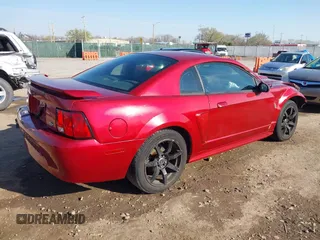 2003 Ford Mustang Standard with VIN 1FAFP40433F312756, listed as a IAAI auction lot 41899595 with 115,584 mi miles. Bid and sale history available at carsss.com. Image 4.