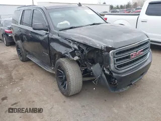 2016 GMC Yukon SLE with VIN 1GKS2AKC9GR249021, listed as a IAAI auction lot 41524997 with 183,272 mi miles. Bid and sale history available at carsss.com. Image 1.