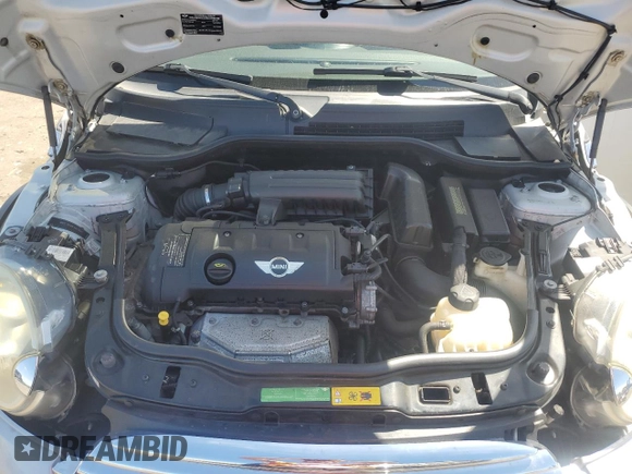 2011 MINI Hardtop with VIN WMWSU3C5XBTX96048, listed as a Copart auction lot 57607955 with 99,632 mi miles and Salvage title. Bid and sale history available at DreamBid. Image 11.