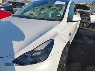 2021 Tesla Model Y Performance with VIN 5YJYGDEF2MF258711, listed as a IAAI auction lot 41367832 with 47,662 mi miles and . Bid and sale history available at DreamBid. Image 6.