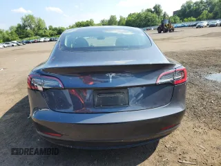 2023 Tesla Model 3 с VIN 5YJ3E1EAXPF594565, выставлен на аукционе Copart как лот 65361925 с пробегом Не указан миль и Списание • Salvage title. История ставок и продаж доступна на DreamBid. Изображение 6.