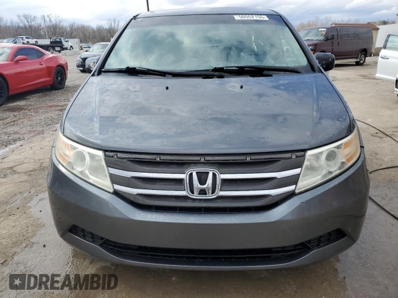 2013 Honda Odyssey EX z VIN 5FNRL5H40DB033400, wystawiony jako Copart lot #50552155 z przebiegiem 223 770 mil mil oraz Nie do naprawy. Historia ofert i sprzedaży dostępna na DreamBid. Obrazek 5.