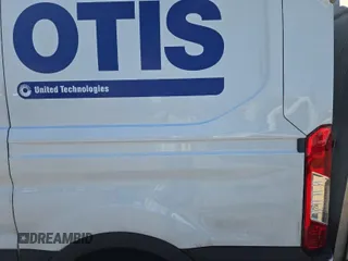 2018 Ford Transit with VIN 1FTBW9CG0JKB22853, listed as a IAAI auction lot 42069070 with 133,489 mi miles. Bid and sale history available at carsss.com. Image 1.
