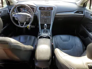2014 Ford Fusion Titanium с VIN 3FA6P0K91ER218320, выставлен на аукционе Copart как лот 41871285 с пробегом 80 151 миль миль и На запчасти • Non repairable. История ставок и продаж доступна на DreamBid. Изображение 8.